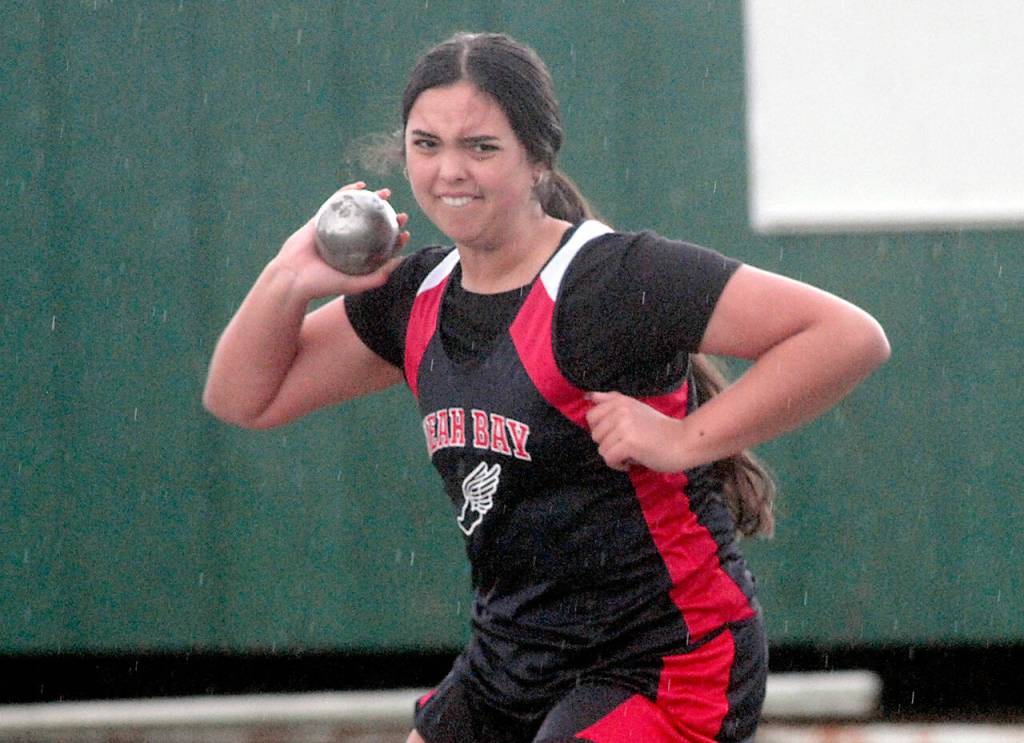 Keith Thorpe/Peninsula Daily News Neah Bays Koren Cumming throws the shot in the girls competition on Thursday in Port Angeles.