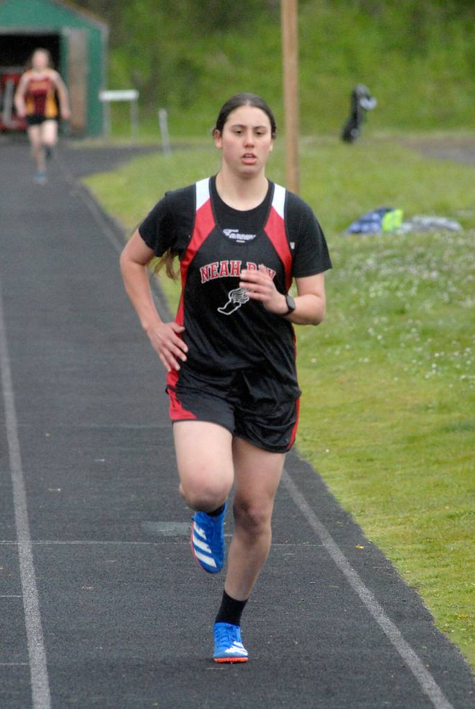 Keith Thorpe/Peninsula Daily News
Neah Bay's Ryana Moss nears the finish line to take third in the girls 1,600-meter race on Thursday in Port Angeles.