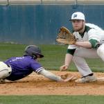 Keith Thorpe/Peninsula Daily News
Port Angeles first baseman Ezra Townsend, right, attempts to catch North Kitsap baserunner Zach Edwards off the bag during Wednesday's game at Port Angeles Civic Field.