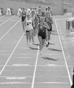 Courtesy of Joanne Carroll-Huemoeller
Sequims Riley Pyeatt leads the field in the 800 meters at the Gear Up Eason Invitational held in Snohomish on April 23.