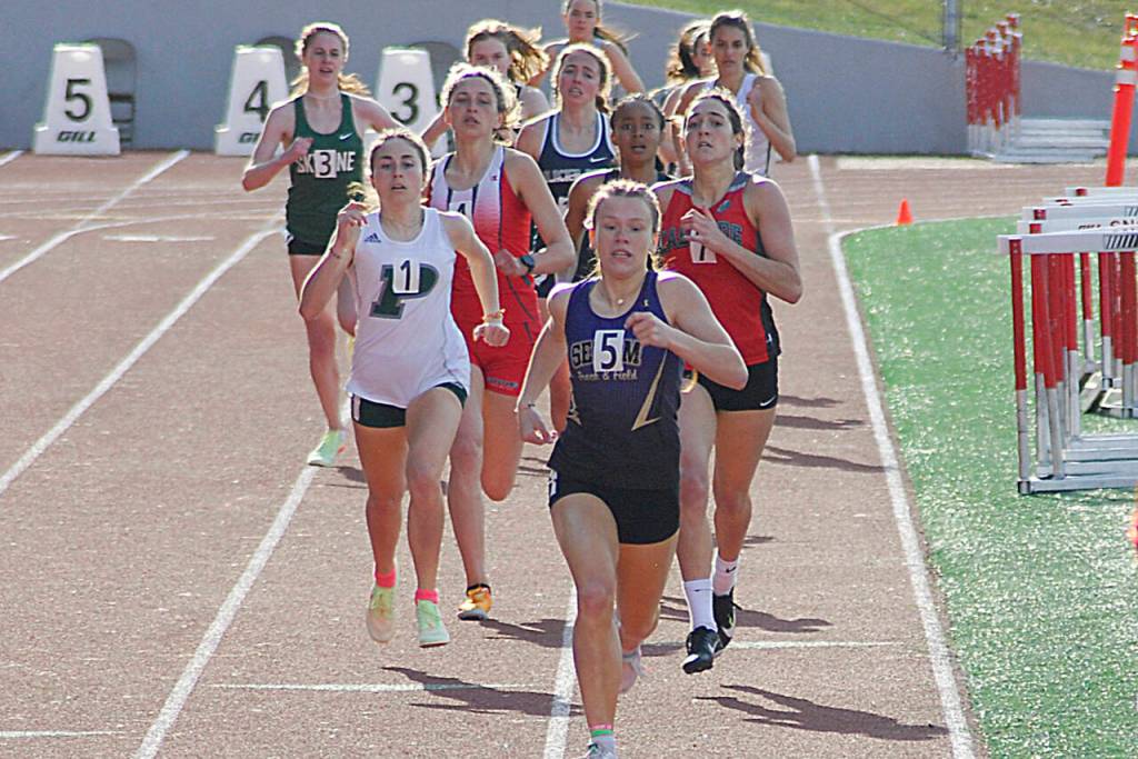 Sequim's Riley Pyeatt leads the field in the 800 meters at the Gear Up Eason Invitational held in Snohomish on April 23. (Photo by Joanne Carroll-Huemoeller)
