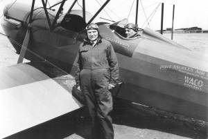 North Olympic History Center
Pilot Maj. Gilbert H. Eckerson, circa 1928, when the landing strip was downtown. Passenger Thomas Aldwell stands in front.