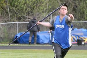 Keith Thorpe/Peninsula Daily News
Titus White of Crescent makes his run up in the javelin competition during Friday's North Olympic League championships at Crescent School in Joyce.