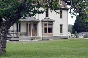 The Worthington Mansion restoration includes 9,000 cedar shingles that were hand dipped bay volunteers two years ago. They are installed on the mansard roof. The top floor of the mansion which is the interior of the roof area is envisioned to become a library area and meeting space. (Peninsula Daily News file)