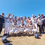 The Forks softball team celebrates representing the west side of the state and qualifying for the state 2B tournament at the Southwest 1/4 tournament this weekend. (Courtesy photo)