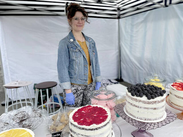Olivia Furtado has been baking since 2017, but this is the first time she is a vendor at the Juan de Fuca Festival street fair. Her Middle Name Baking Co. booth features layer cakes, macarons, cookies, and tarts. (Paula Hunt/Peninsula Daily News)