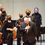 Conductor and Music Director Jonathan Pasternack bows to the audience after the Port Angeles Symphony Orchestra's return to the stage this past season. photo courtesy Port Angeles Symphony Orchestra
