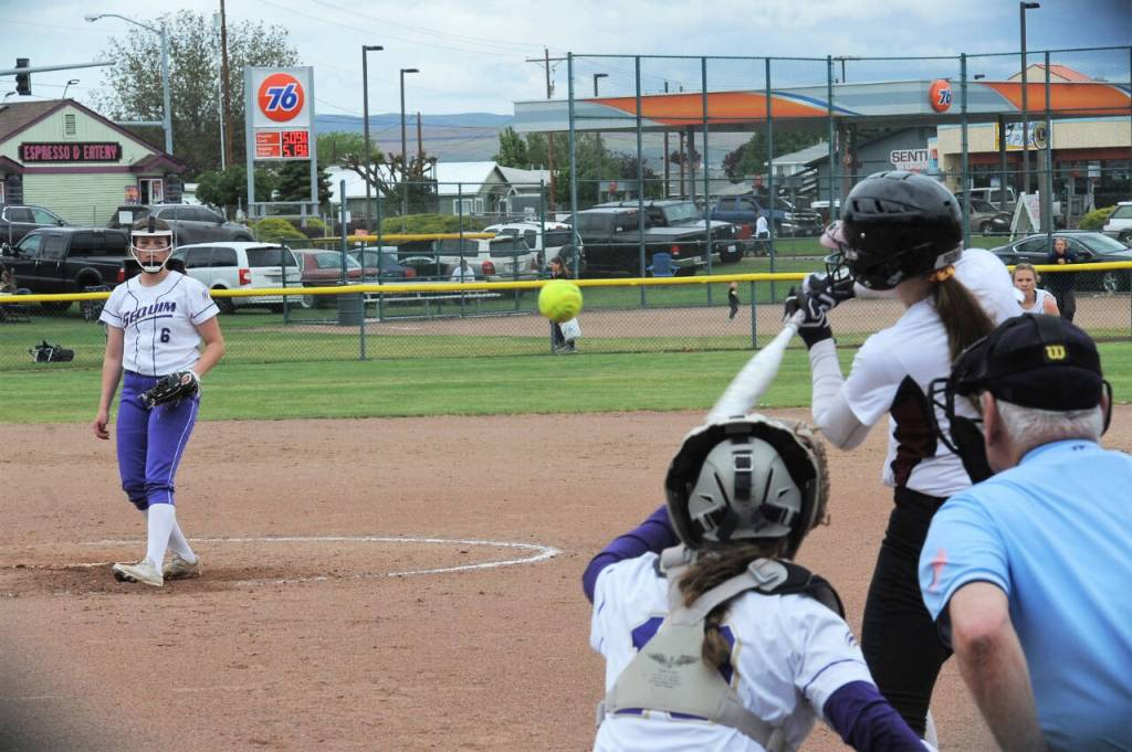 Sequims Angel Wagner pitches against Cedarcrest at the state 2A tournament in Selah. (Lonnie Archibald/for Peninsula Daily News)
