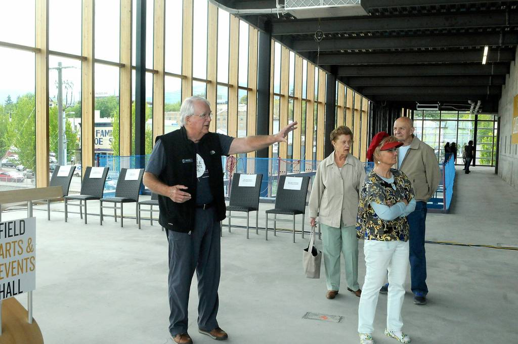 Field Arts & Events Hall Board President Brooke Taylor describes features of the building during an open house on Thursday. (Keith Thorpe/Peninsula Daily News)