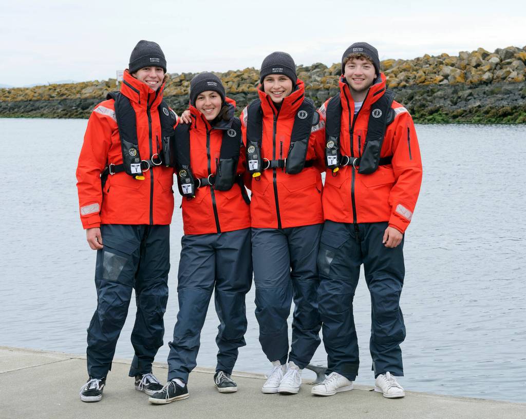 Team Mustang Survivals Rite of Passage didnt know each other well before they began training together, so theyve been working with a race coach on mental strategies and teambuilding. Their average age is less than 17-years-old. (L-R) Enzo Dougherty, Francesca Dougherty, Nadia Khalil and Sebastian Dougherty. (Photo Raed Khalil)