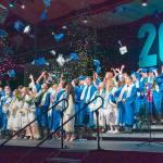 Hats and confetti take to the air at the end of the Chimacum High School graduation ceremony at Fort Wordens McCurdy Pavilion on Saturday. Fifty-four seniors were awarded diplomas, marking the end of their high school careers. (Steve Mullensky/for Peninsula Daily News)