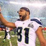 The Associated Press
Golden Tate celebrates after the Seattle Seahawks won Super Bowl XLVIII in 2014. Tate, who also played baseball in college at Notre Dame, will play for the Port Angeles Lefties tonight at Civic Field.