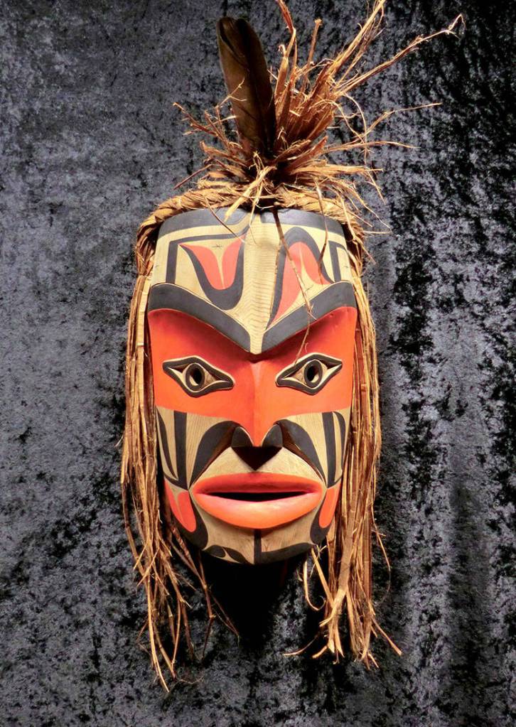 Alex McCartys carvings include a Friendship Mask, Serpent Rattle and Wolf Rattle.