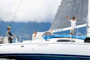 Team Pure and Wild, from left, Alyosha Strum-Palerm, Jonathan McKee and Matt Pistay, sail into Ketchikans Thomas Basin harbor Monday to win the 750-mile Race to Alaska. (Thomas Hawthorne)