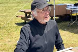 Bruce Colfax was one of many Makah who worked at the Ozette excavation that ran for 11 years starting in 1970. Colfax, an artist whose wood carvings, sculpture and prints belong in private and public collections across the country, is a former member of the Makah Cultural & Research Center board of trustees whose role it is to protect the artifacts found at the site. (Paula Hunt/Peninsula Daily News)