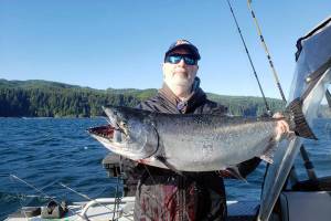 Everett's Marvin Livermont caught this king with a purple haze lure while fishing the Garbage Dump off Neah Bay. Due to high king catch estimates, the state Department of Fish and Wildlife has suspended salmon fishing beginning today east of the Bonilla-Tatoosh line and July 5 west of the line.
