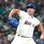 Seattle Mariners starting pitcher Robbie Ray winds up against the Oakland Athletics at T-Mobile Park in Seattle on Sunday. Ray struck out 12 batters in a 2-1 Seattle victory. (Ted S. Warren/The Associated Press)