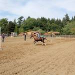 Samantha Parks weaves through the team pole bending competition at a PSHA competition held last weekend at the Crosbys Arena in Agnew. (Karen Griffiths / for Peninsula Daily News)