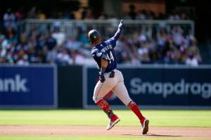 The Seattle Mariners Julio Rodriguez reacts after hitting a two-run home run during the fourth inning of a baseball game against the San Diego Padres on Monday in San Diego. (Gregory Bull/The Associated Press)