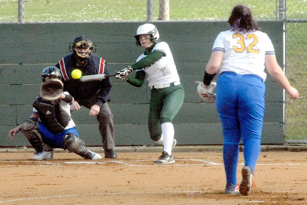 Port Angeles Lily Halberg bats in the first inning as Bremerton catcher Attianna Cabato waits for the delivery from pitcher Brooke Baker on Tuesday in Port Angeles. (Keith Thorpe/Peninsula Daily News)