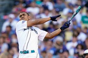 American League's Julio Rodriguez, of the Seattle Mariners, bats during the MLB All-Star baseball Home Run Derby, Monday, July 18, 2022, in Los Angeles. (AP Photo/Abbie Parr)