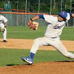 Dillon Dibrell of the PA Lefties fires in a fast pitch to the batter from Kamloops Northpaws. He is backed up by his 3rd baseman B.Y. Choi. dlogan
