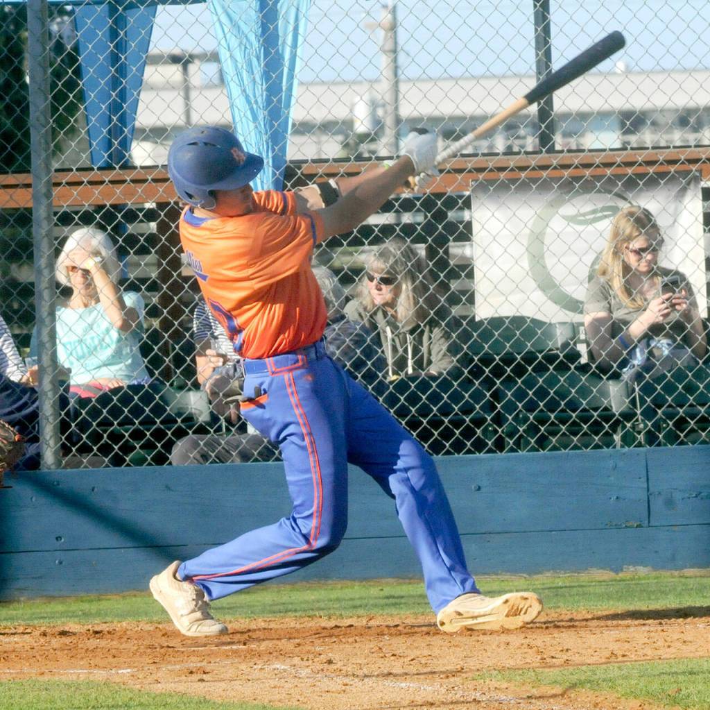 Keith Thorpe/Peninsula Daily News Lefties Weston Peninger bats in the first inning against Redmond on Thursday evening in Port Angeles.