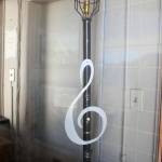 A ghostlight, a traditional playhouse fixture and signature of Ghostlight Productions, stands in the box office of the Lincoln Theater in Port Angeles. (Keith Thorpe/Peninsula Daily News)