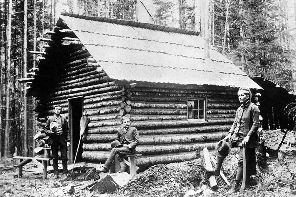 Lt to Rt:   Unidentified man, George Venerable Smith-seated, Ione Tomlinson 
North Olympic History Center