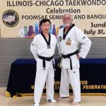 Courtesy photo
Port Angeles' Robert Nicholls with Jo Jah Oh, head technical director from the taekwondo world headquarters in South Korea at the Chicago Taekwondo Day celebration.