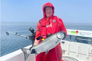 SeaWalker charter skipper Fred Walker caught this good-sized chinook while fishing out of Neah Bay. Upon filetting, the flesh was found to be white, caused by a recessive genetic trait found mainly in kings from the Fraser River north to Alaska.