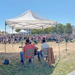 Steve Mullensky/for Peninsula Daily News
The largest audience of the summer showed up for the final Free Fridays at the Fort blues concert by performed by musicians Jayy Hopp, left, and Andrew Alli on the Commons at Fort Worden State Park on Friday. That night, the The Port Townsend Acoustic Blues Festival also hosted Blues in the Clubs. Today, the Centrum program will present the Acoustic Blues Showcase Concert on Littlefield Green outside the McCurdy Pavilion at 1:30 p.m. and host another Blues in the Clubs tonight. For information, and tickets, see https://centrum.org/programs/blues/.