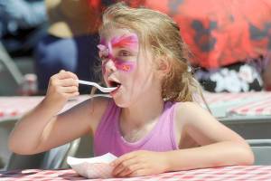 Gloria Fitzpatrick, 6, of Port Angeles enjoys a slice of blackberry pie a la mode during Saturdays Joyce Daze celebration. (Keith Thorpe/Peninsula Daily News)
