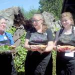 Winners of the annual Joyce Daze blackberry pie contest, from left, Ann Ravagni of Joyce in first place, Rachel Rice of Joyce in second and Ariana Varholla of Sequim in third celebrate their victory after judging. Eleven pies were entered in this years competition. (Keith Thorpe/Peninsula Daily News)
