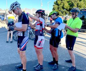 Cyclists are required to wear a helmet and keep their number bib visible at all times during Ride the Hurricane. Only registered riders can participate in the popular annual event  one of the rare times the road to Hurricane Ridge in the Olympic National Park is closed to traffic. (Paula Hunt/Peninsula Daily News)