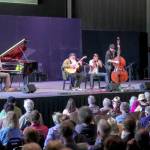 Centrum Acoustic Blues faculty, from left, Carl Leyland, Rodrigo Mantovani, Andrew Alli and Jimmy Vivino play a set during the Acoustic Blues Showcase at McCurdy Pavilion on Saturday. (Steve Mullensky/for Peninsula Daily News)