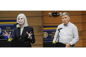 Michael Dashiell /Olympic Peninsula News Group

Cherie Kidd and Bruce Emery (seated), candidates for Clallam County Director of Community Development, speak at a debate hosted by the Rotary Club of Sequim at the Dungeness River Center.