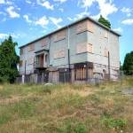 The Port Townsend City Council seeks to sell the Cherry Street property that had been barged over from Canada five years ago to become affordable housing. (Steve Mullensky/for Peninsula Daily News)