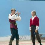 Henry Wendel as the sheriff tells his assistant, played by Mchenry Miller, his plan to capture Robin.