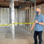 Dr. Michael Maxwell, CEO of the North Olympic Healthcare Network, conducts a short tour of the organizations future Eastside Health Center at 1026 E. First St. in Port Angeles during an open house on Saturday. The clinic, located in the former Ednas Place building, will house medical services and administrative offices with an opening scheduled for late December. (Keith Thorpe/Peninsula Daily News)