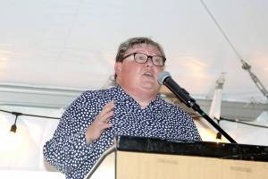 Dave Logan/for Peninsula Daily News
Marcia Isenberger, a three-sport star at Port Angeles High School who went on to become the top tennis player at Eastern Washington, speaks at the Roughrider Hall of Fame dinner Saturday night.