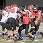Lonnie Archibald/for Peninsula Daily News
Neah Bay senior Julian Carrick looks for running room during a 2021 game against Mossyrock. Carrick is once again expected to start at quarterback and in the secondary for the Red Devils this season.