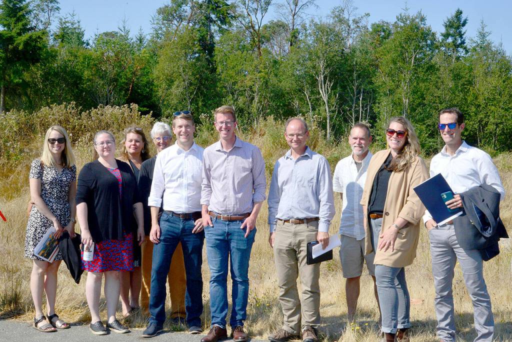 U.S. Rep. Derek Kilmer, a Democrat representing Washingtons 6th Congressional District, stands with officials from Port Townsend on Wednesday, part of a tour of local projects his office is working to secure funding for. (Peter Segall / Peninsula Daily News)