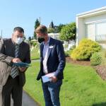 Jefferson Healthcare Chief Ancillary and Support Services Officer Jacob Davidson speaks with U.S. Rep. Derek Kilmer, a Democrat representing the Olympic Peninsula, outside the hospital facility in Port Townsend on Wednesday. (Courtesy photo).