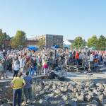 Several hundred people assembled at Pope Marine Park on Thursday for the final Concert on the Dock presented by the Port Townsend Main Street Association but also, for a Community Portrait that happened during intermission. (Steve Mullensky/for Peninsula Daily News)