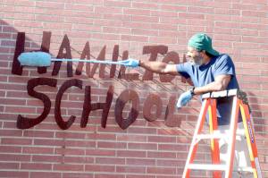 Mike Daniels, a janitor at Hamilton Elementary School in Port Angeles, does some last-minute preparation to get the school ready for kids returning on Thursday. Quilcene and Brinnon schools started class today, while the first day for other Peninsula schools is Wednesday for Forks, Thursday for Cape Flattery, Sept. 6 for Port Townsend and Chimacum, and Sept. 7 for Sequim. Crescent started school last Thursday. (Dave Logan/for Peninsula Daily News)