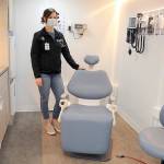 Maria Melvin, an advanced registered nurse practitioner for the North Olympic Healthcare Network, stands in the examination room of the organizations mobile health clinic during a session at Port Angeles High School. (Keith Thorpe/Peninsula Daily News)