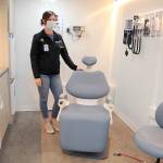 Maria Melvin, an advanced registered nurse practitioner for the North Olympic Healthcare Network, stands in the examination room of the organizations mobile health clinic during a session at Port Angeles High School. (Keith Thorpe/Peninsula Daily News)