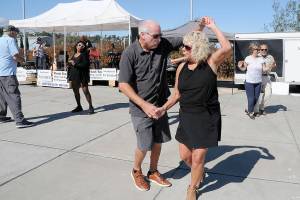 John and Freia Palmer of Port Angeles dance to the music of Sound Advice during Saturdays Jammin in the Park at Pebble Beach Park on the Port Angeles waterfront. The event, hosted by the NorWester Rotary Club, featured a day of music, food and a beer garden, as well as numerous informational displays. (Keith Thorpe/Peninsula Daily News)