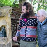 Diane Urbani de la Paz/for Peninsula Daily News
Composer Noah Michael Smith, left, and Camaraderie Cellars winemaker Don Corson admire “Spirit of Hildegard,” Corson’s sculpture in jade. Smith and Corson have collaborated on a performance celebrating Hildegard von Bingen this Saturday.
